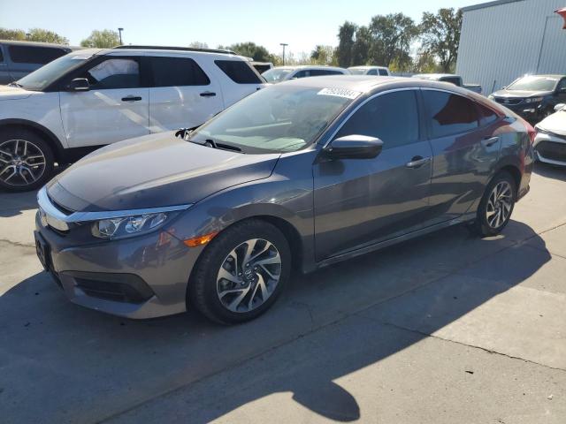 HONDA CIVIC EX 2017 with VIN 2HGFC2F72HH558796 - Photo from auction