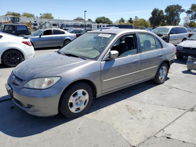 HONDA CIVIC HYBR 2004 with VIN JHMES95664S011983 - Photo from auction