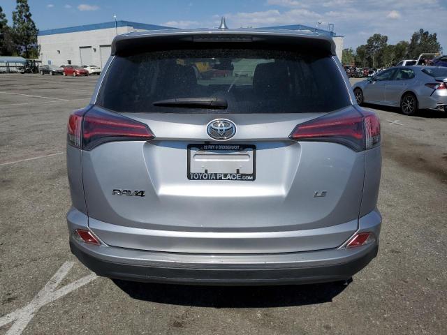 Photo 6 from auction – 2018 TOYOTA RAV4 LE with VIN JTMZFREV7JD129023