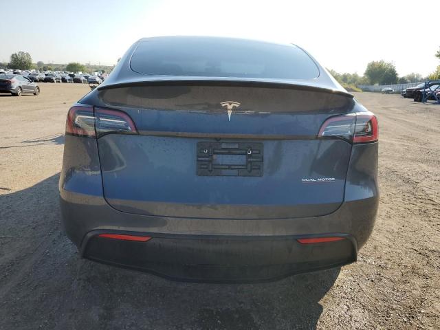 Photo 6 from auction – 2022 TESLA MODEL Y with VIN 7SAYGDEF3NF521115