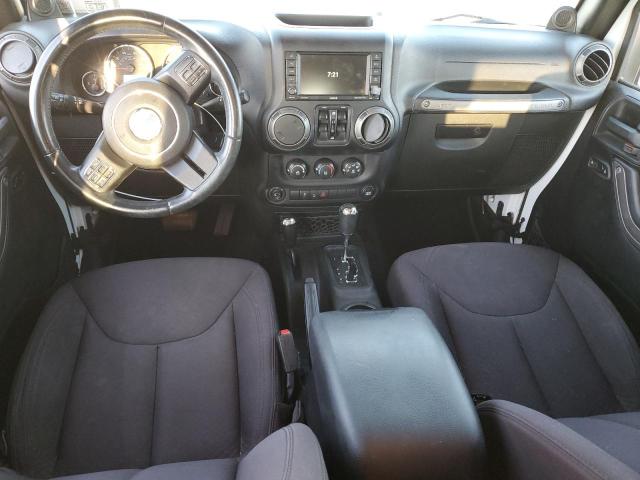 Photo 8 from auction – 2014 JEEP WRANGLER U with VIN 1C4BJWDG2EL313136