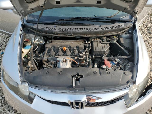 Photo 11 from auction – 2011 HONDA CIVIC LX with VIN 19XFA1F56BE020215