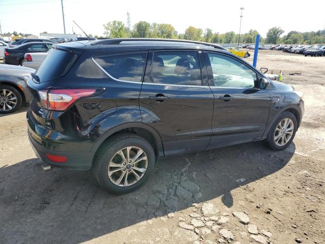 Photo 3 from auction – 2017 FORD ESCAPE SE with VIN 1FMCU9G98HUC36020
