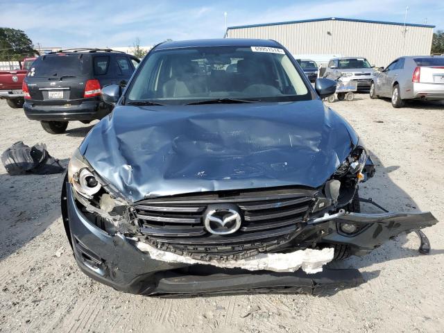 Photo 5 from auction – 2016 MAZDA CX-5 GT with VIN JM3KE2DY4G0767647