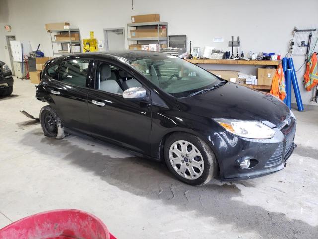 Foto 4 de la subasta – 2012 FORD FOCUS SE con VIN 1FAHP3K2XCL341459