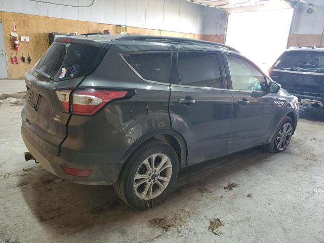 Photo 3 from auction – 2017 FORD ESCAPE SE with VIN 1FMCU9G9XHUB52040