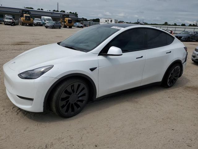 TESLA MODEL Y 2023 с VIN 7SAYGDEF7PF702074 - Фото с аукциона