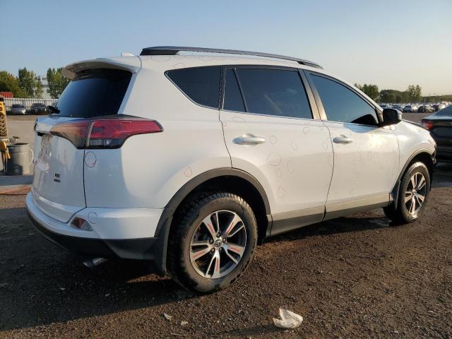 Photo 3 from auction – 2018 TOYOTA RAV4 LE with VIN 2T3BFREV2JW719537