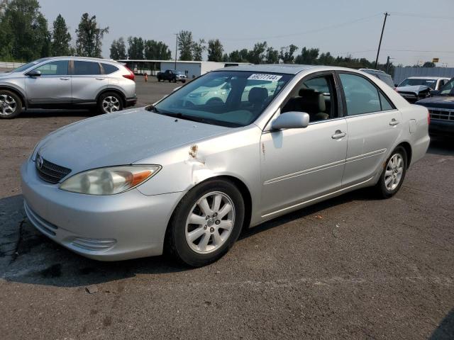 TOYOTA CAMRY LE 2002 with VIN 4T1BF30K12U500668 - Photo from auction