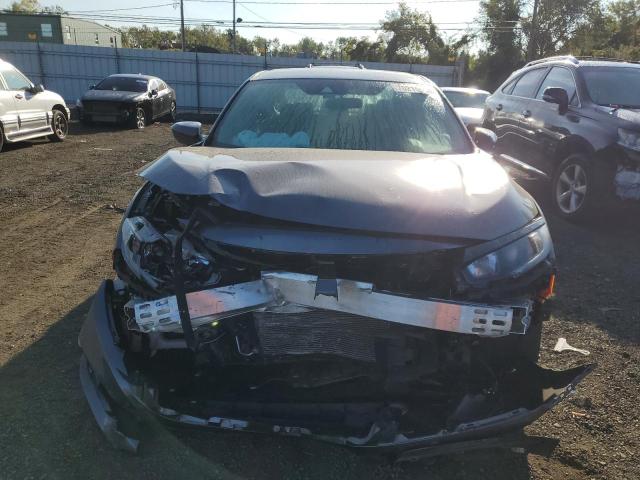 Photo 5 from auction – 2020 HONDA CIVIC 4D E with VIN 19XFC2F84LE011945
