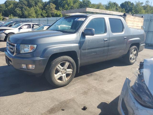 HONDA RIDGELINE 2011 with VIN 5FPYK1F52BB455000 - Photo from auction