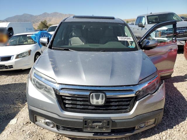 Photo 5 from auction – 2025 HONDA RIDGELINE with VIN 5FPYK3F79JB008238