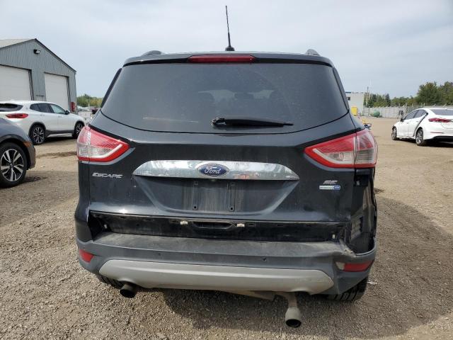Photo 6 from auction – 2014 FORD ESCAPE SE with VIN 1FMCU9GX8EUD67796