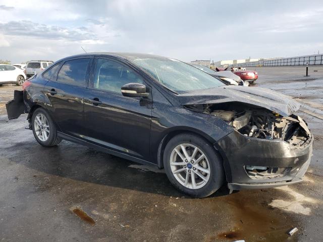 Photo 4 from auction – 2016 FORD FOCUS SE with VIN 1FADP3F23GL379954