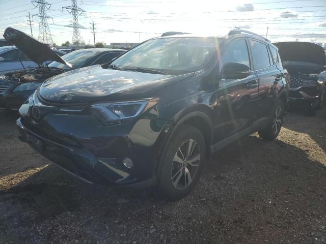 TOYOTA RAV4 ADVEN 2018 with VIN 2T3RFREV2JW772740 - Photo from auction