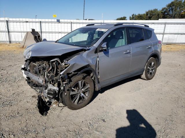 TOYOTA RAV4 XLE 2017 with VIN 2T3WFREV0HW374648 - Photo from auction