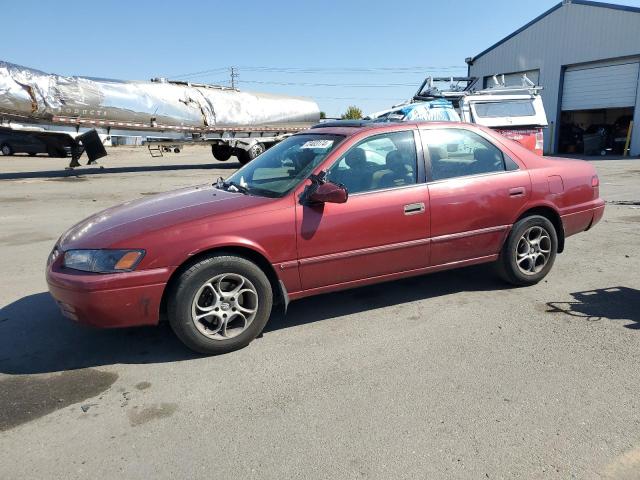 TOYOTA CAMRY CE 1997 with VIN 4T1BF22K5VU011041 - Photo from auction