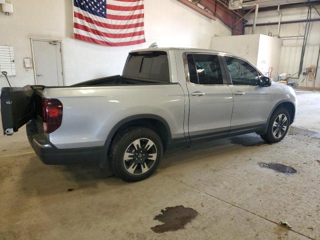 Photo 3 from auction – 2020 HONDA RIDGELINE with VIN 5FPYK3F57LB015853