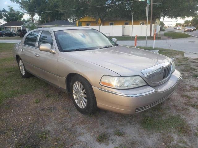 LINCOLN TOWN CAR E 2003 with VIN 1LNHM81W13Y687189 - Photo from auction