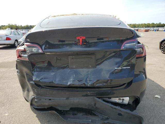 Photo 6 from auction – 2023 TESLA MODEL Y with VIN 7SAYGAEE1PF909386