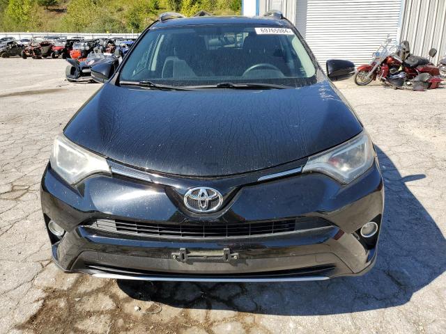 Photo 5 from auction – 2016 TOYOTA RAV4 XLE with VIN 2T3RFREV2GW438362