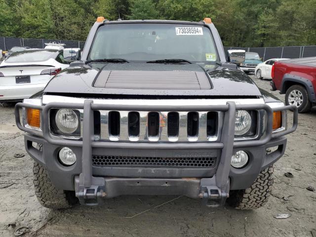 Photo 5 from auction – 2006 HUMMER H3 with VIN 5GTDN136568111185