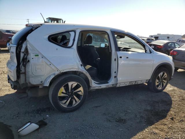 Photo 3 from auction – 2015 HONDA CR-V TOURI with VIN 5J6RM4H96FL077091
