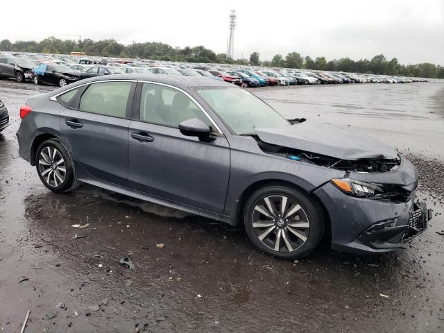 Photo 4 from auction – 2022 HONDA CIVIC EX with VIN JHMFE1F76NX001348