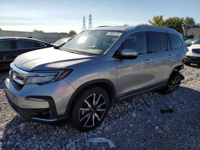 Photo 1 from auction – 2022 HONDA PILOT TOUR with VIN 5FNYF6H62NB045754