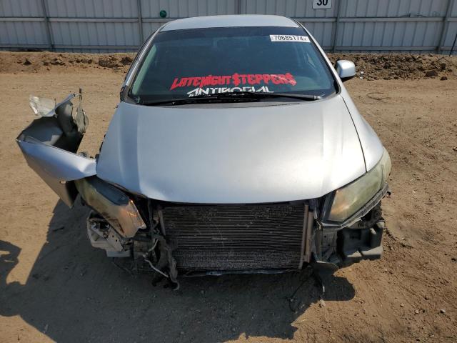 Photo 5 from auction – 2013 HONDA CIVIC LX with VIN 2HGFB2F57DH561737