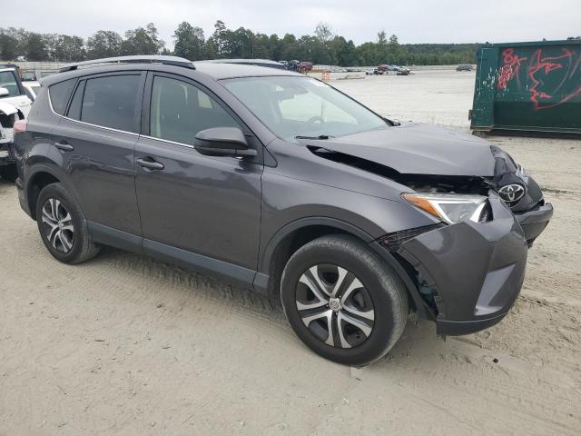 Photo 4 from auction – 2017 TOYOTA RAV4 LE with VIN JTMZFREV8HJ121489