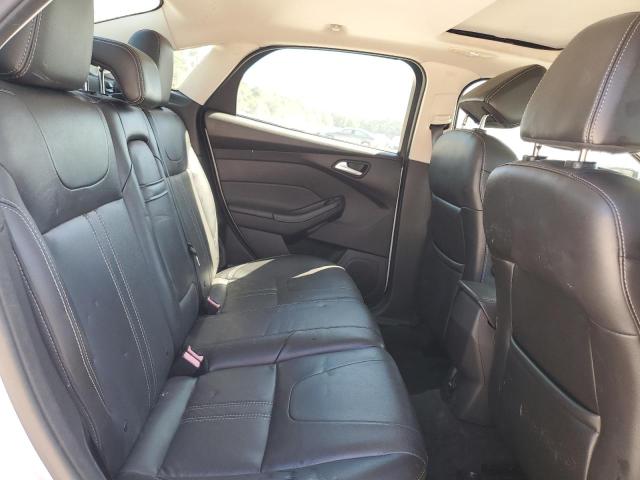 Photo 10 from auction – 2013 FORD FOCUS SE with VIN 1FADP3F21DL123355