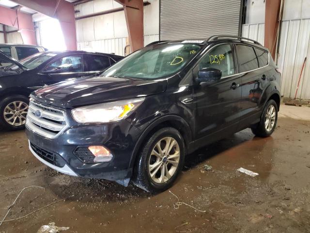 FORD ESCAPE SE 2018 with VIN 1FMCU9GD3JUA10963 - Photo from auction