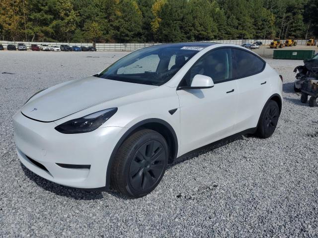 TESLA MODEL Y 2024 with VIN 7SAYGDED1RA301120 - Photo from auction