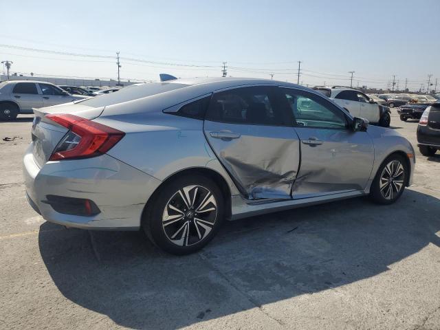 Photo 3 from auction – 2016 HONDA CIVIC EXL with VIN 19XFC1F70GE009200