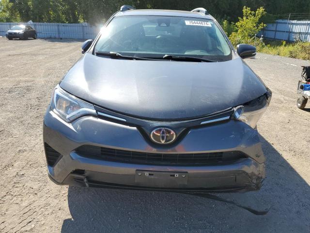 Photo 5 from auction – 2018 TOYOTA RAV4 LE with VIN 2T3ZFREV7JW485779