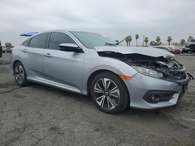 Photo 4 from auction – 2017 HONDA CIVIC EXL with VIN 2HGFC1F75HH648082
