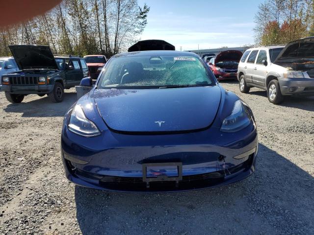 Photo 5 from auction – 2022 TESLA MODEL 3 with VIN 5YJ3E1EB8NF273601