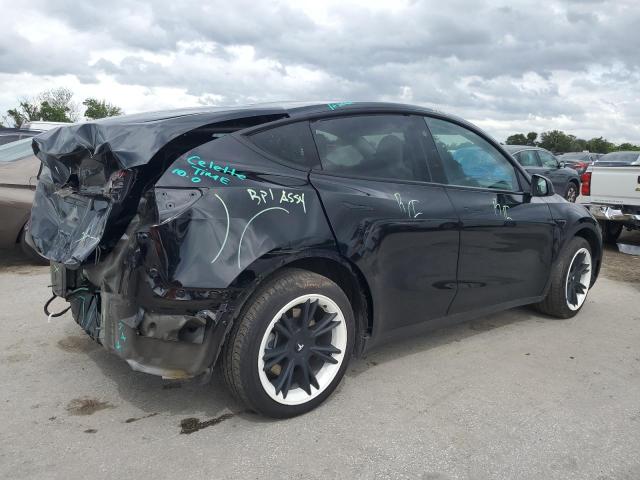 Photo 3 from auction – 2023 TESLA MODEL Y with VIN 7SAYGDEE0PF893439
