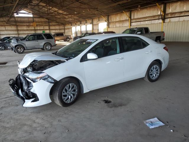 TOYOTA COROLLA L 2018 with VIN 5YFBURHE3JP803040 - Photo from auction