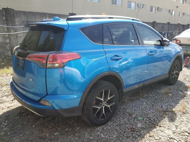 Photo 3 from auction – 2018 TOYOTA RAV4 SE with VIN JTMNFREV0JD121845