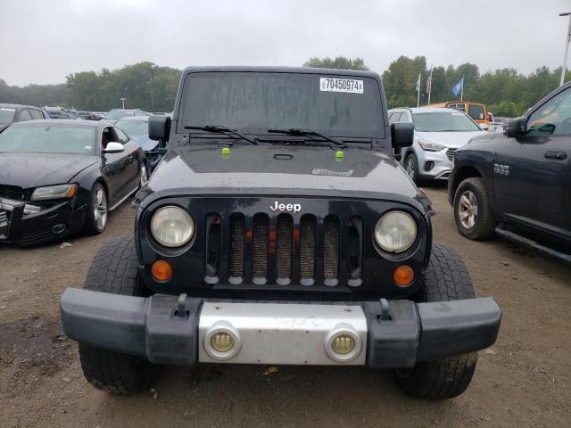 Photo 5 from auction – 2011 JEEP WRANGLER U with VIN 1J4BA5H10BL560158