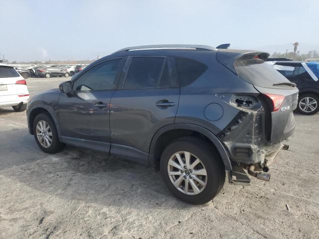 Photo 2 from auction – 2013 MAZDA CX-5 SPORT with VIN JM3KE2BE6D0147497