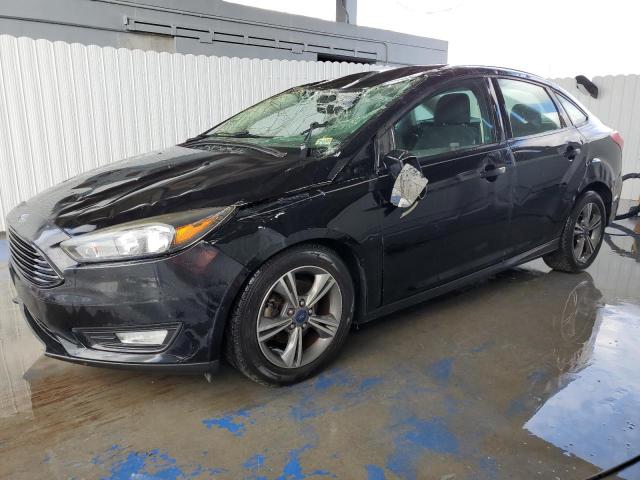 FORD FOCUS SE 2017 with VIN 1FADP3FE2HL242595 - Photo from auction