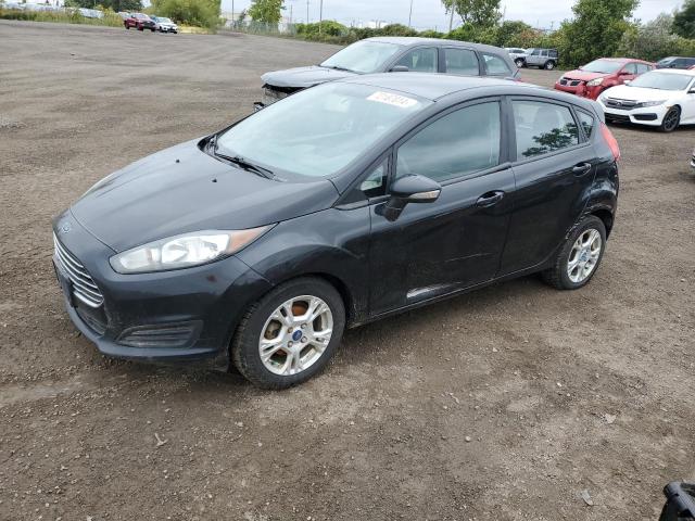 FORD FIESTA SE 2014 with VIN 3FADP4EJ8EM143925 - Photo from auction