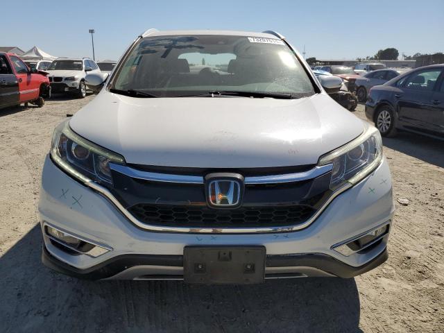 Photo 5 from auction – 2016 HONDA CR-V TOURI with VIN 5J6RM3H95GL011062