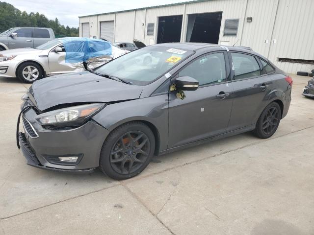 FORD FOCUS SE 2016 with VIN 1FADP3F22GL393411 - Photo from auction