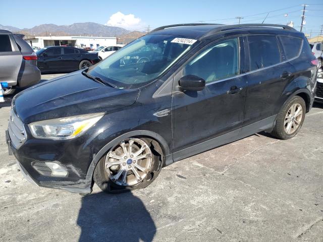 FORD ESCAPE SE 2018 with VIN 1FMCU0GD6JUB75742 - Photo from auction