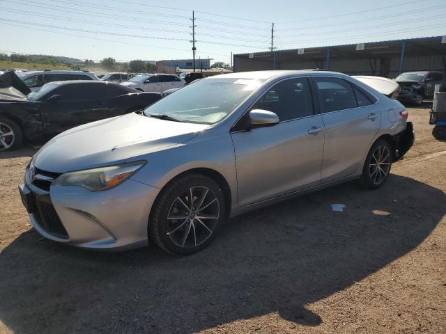 TOYOTA CAMRY LE 2016 with VIN 4T1BF1FK1GU151496 - Photo from auction