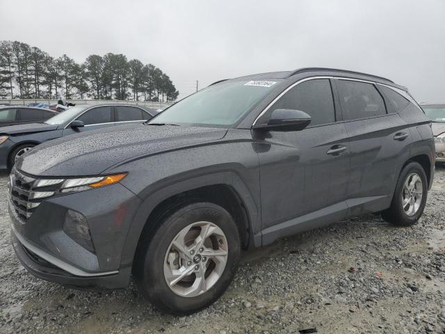 HYUNDAI TUCSON SEL 2023 with VIN 5NMJBCAE0PH168791 - Photo from auction